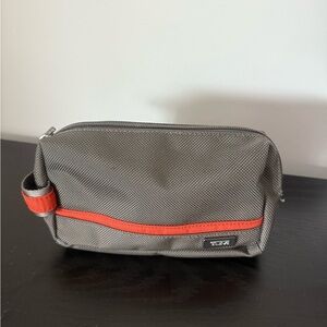 Tumi Gray and orange Toiletry Bag